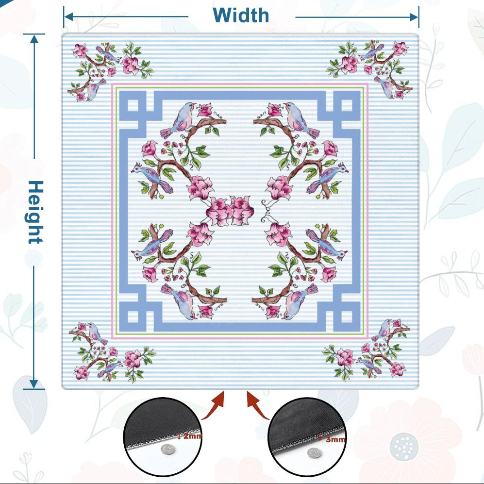 Size information diagram for a square floral needlepoint canvas, showing the measured width and height with decorative blue text and two circular close-up detail insets at the bottom.