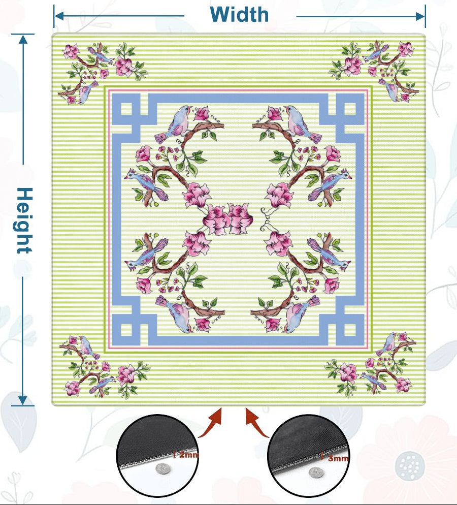 Size information diagram for a square floral needlepoint canvas featuring birds and pink flowers on a pale green striped background with a blue geometric border, shown on a white background with decorative floral graphics.